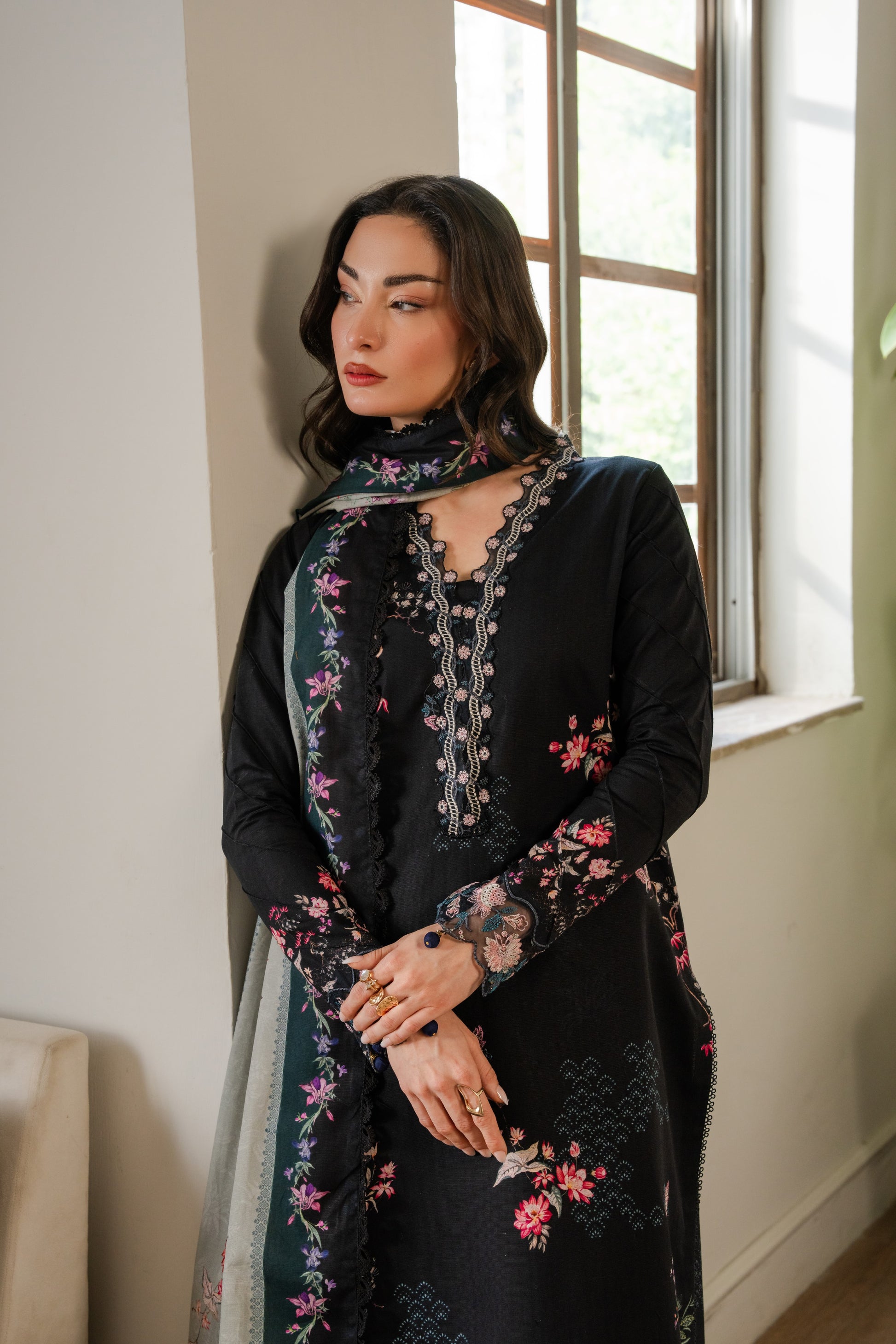 Cozy khaddar dress featuring embroidered neckline, organza borders, and colorful printed dupatta.