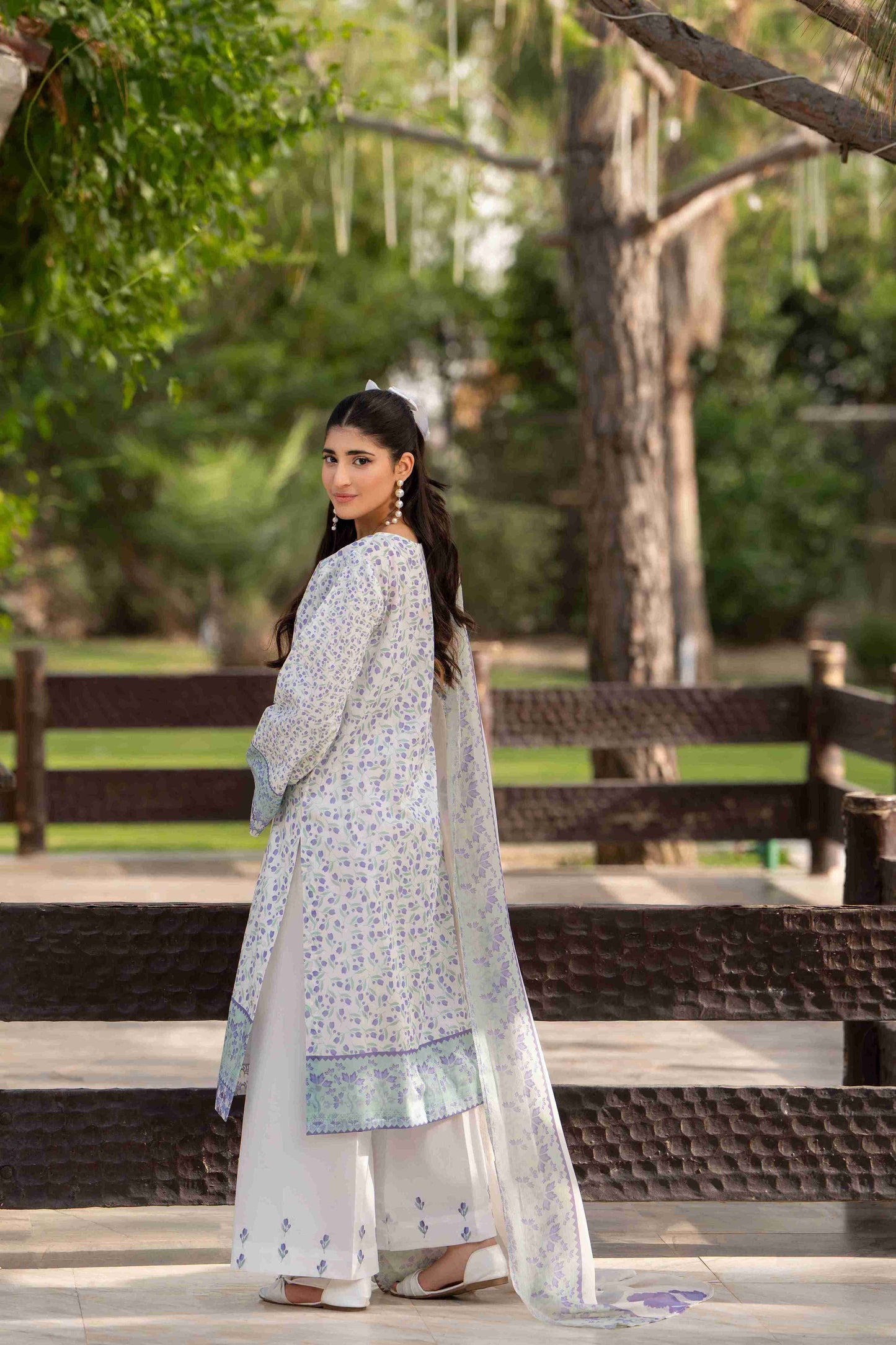 Premium lawn shirt paired with chiffon dupatta and cotton trouser, designed for simple summer charm
