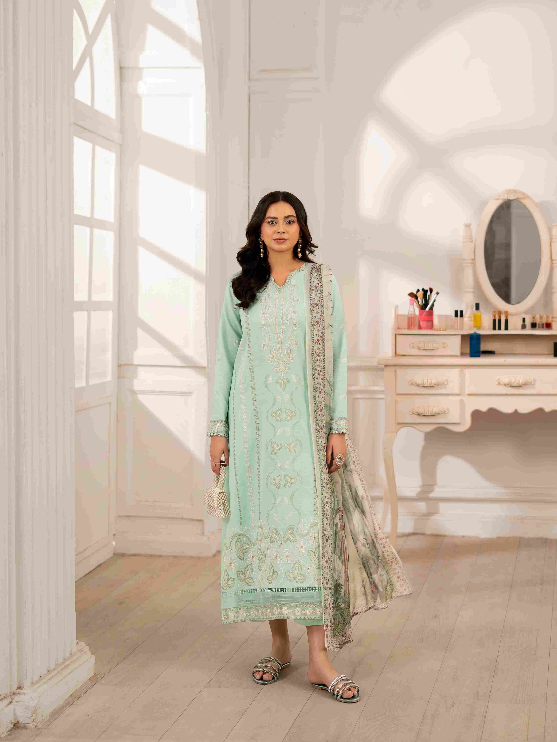 Stylish embroidered lawn shirt styled with chiffon dupatta and cotton trouser