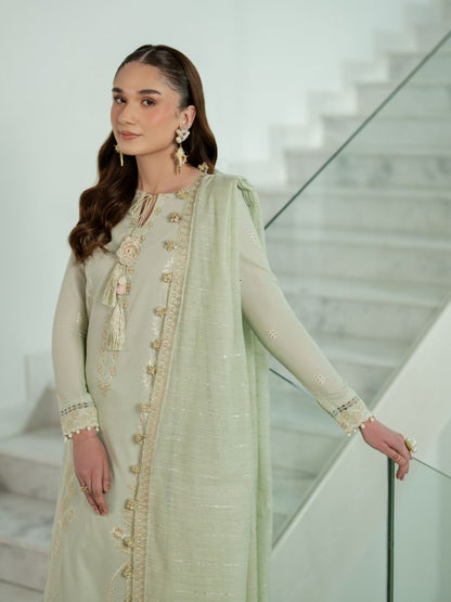 Stitched summer suit featuring embroidery, organza patch, and cotton dupatta