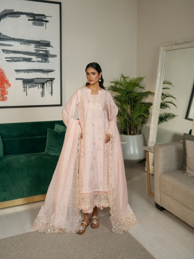 Summer cream color stitched dress featuring embroidered sleeves, shirt, and cotton dupatta.
