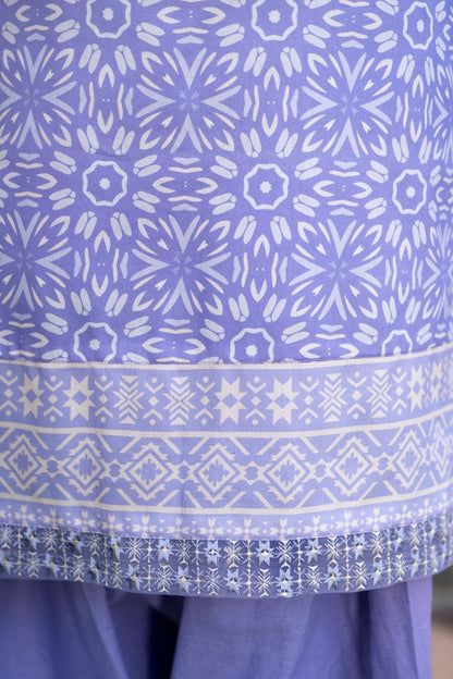 A graceful set in lawn and cotton, uplifted by a lightweight printed chiffon dupatta that adds effortless charm