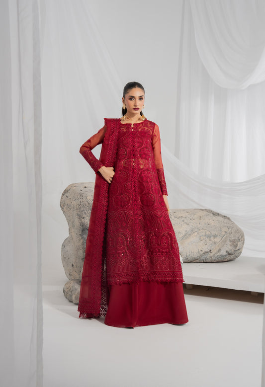 Traditional festive dress featuring an embroidered organza shirt