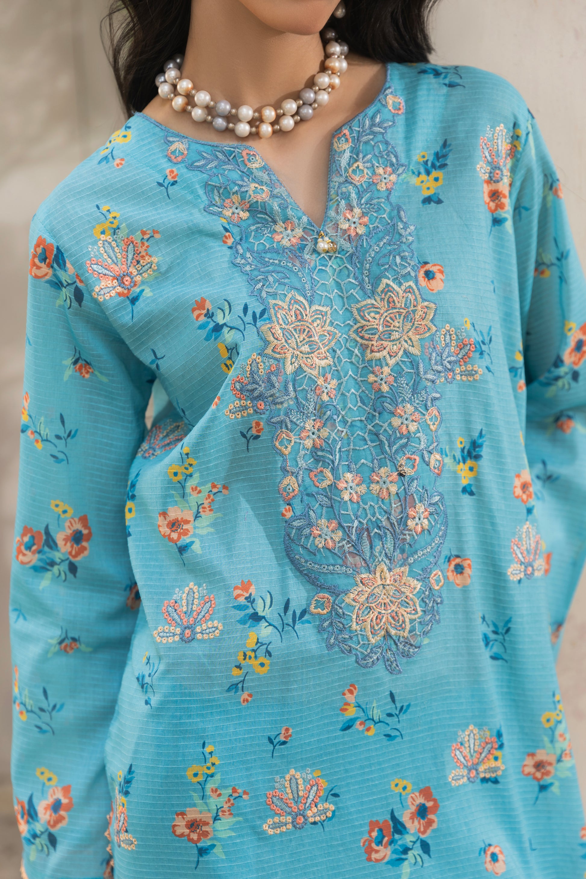 Soft embroidered lawn shirt with digitally printed design, chiffon dupatta, and plain cotton trouser