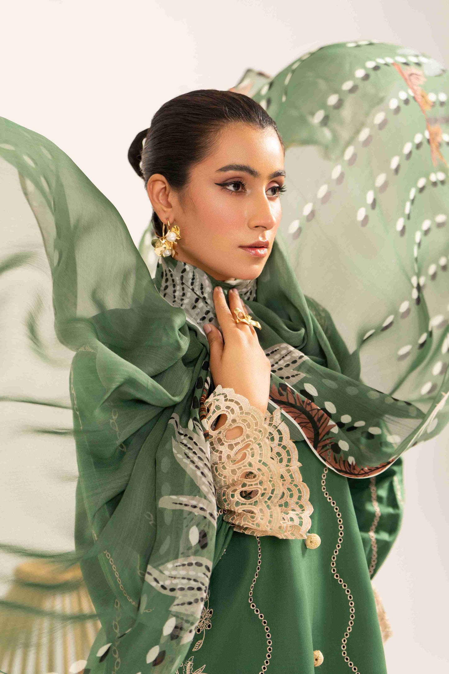  Trendy embroidered lawn shirt styled with chiffon printed dupatta and cotton trouser