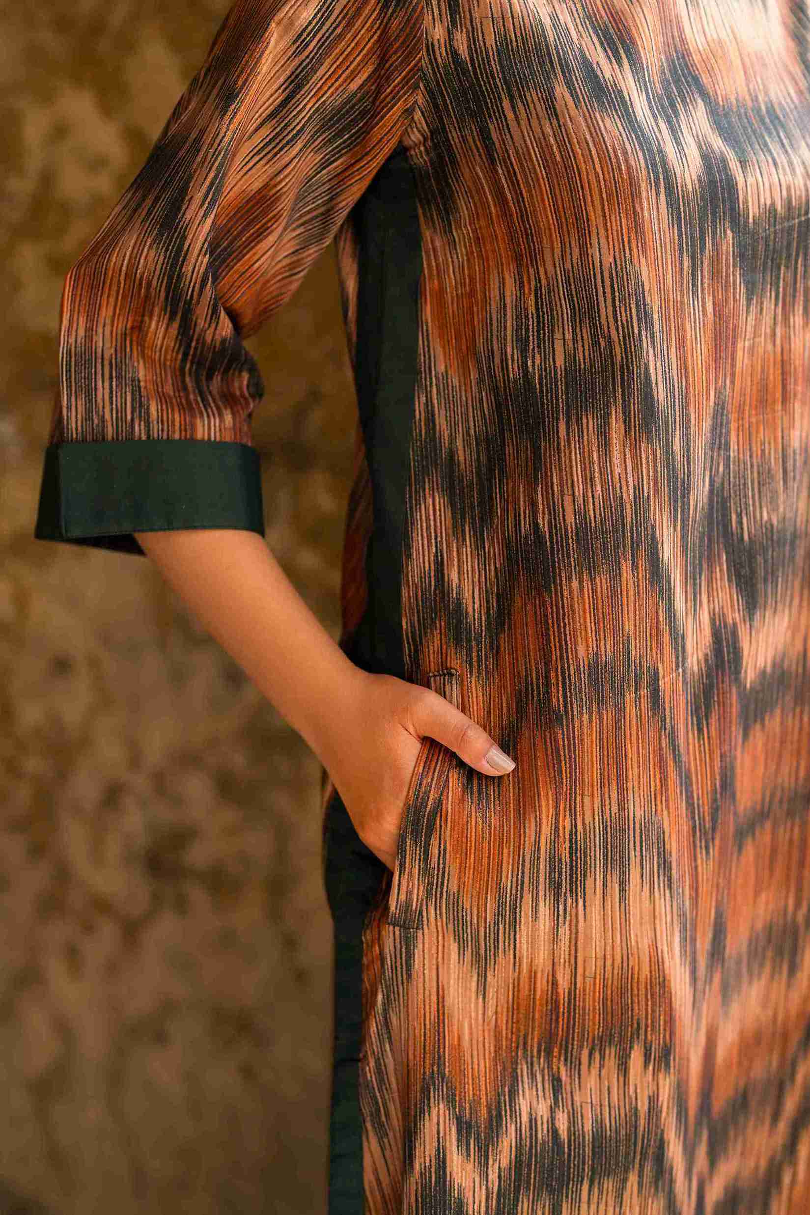 Modern Jacquard kurta with stylish bell sleeves and cotton trousers