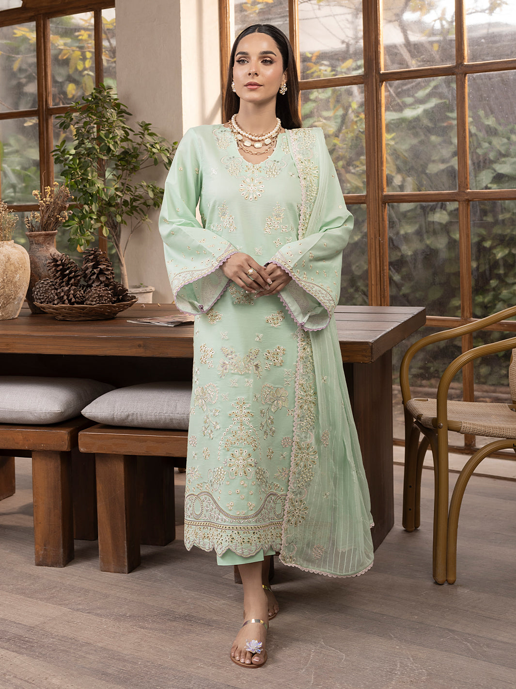 Fancy printed lawn suit with embroidered neckline and dupatta, designed for young eastern fashion