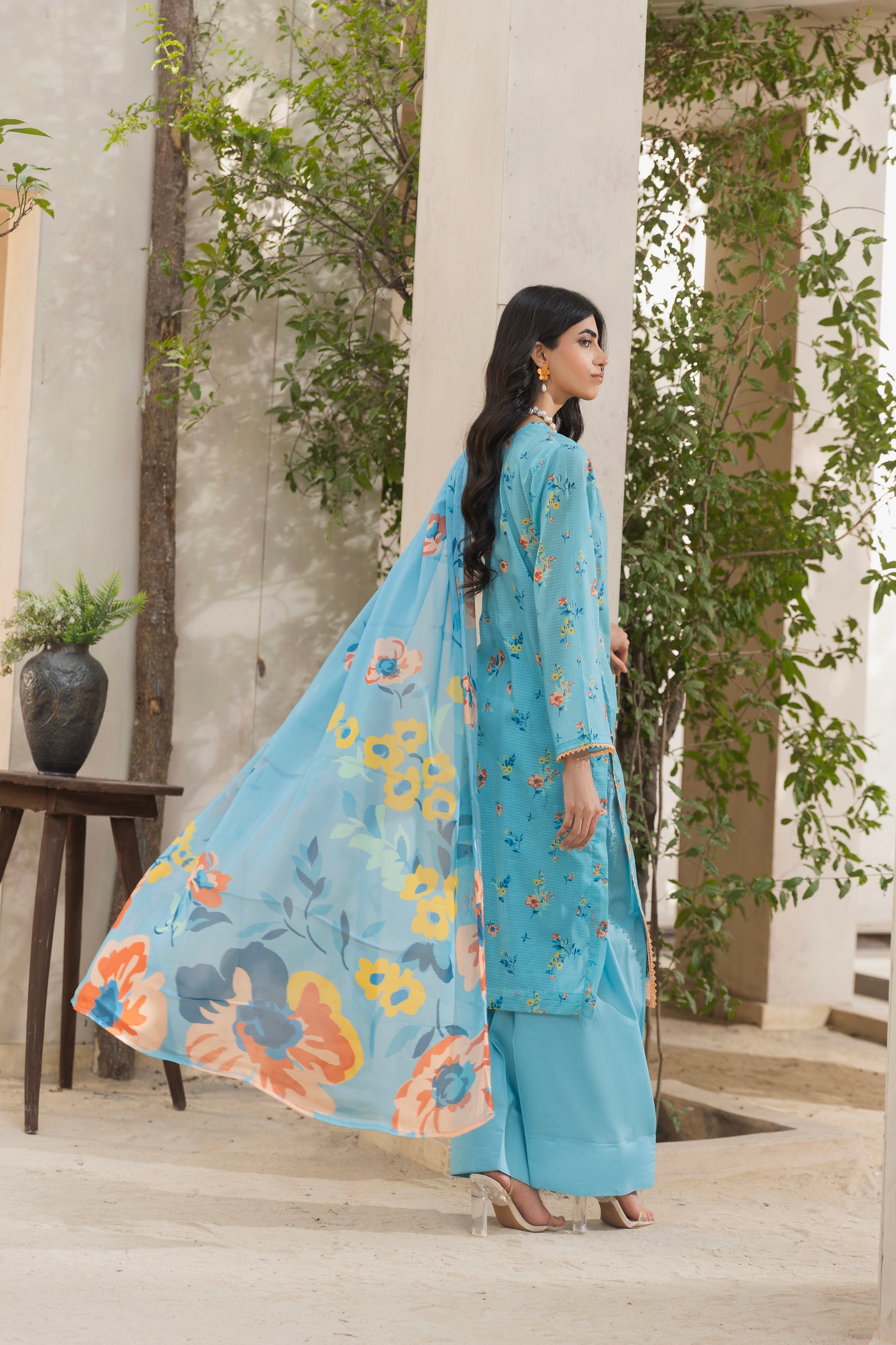 Printed lawn shirt with embroidered front, chiffon dupatta, and plain trouser perfect for eastern wear
