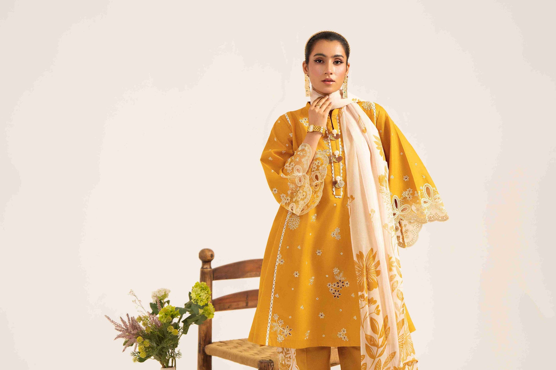  Unstitched embroidered lawn shirt styled with chiffon dupatta and plain cotton trouser.
