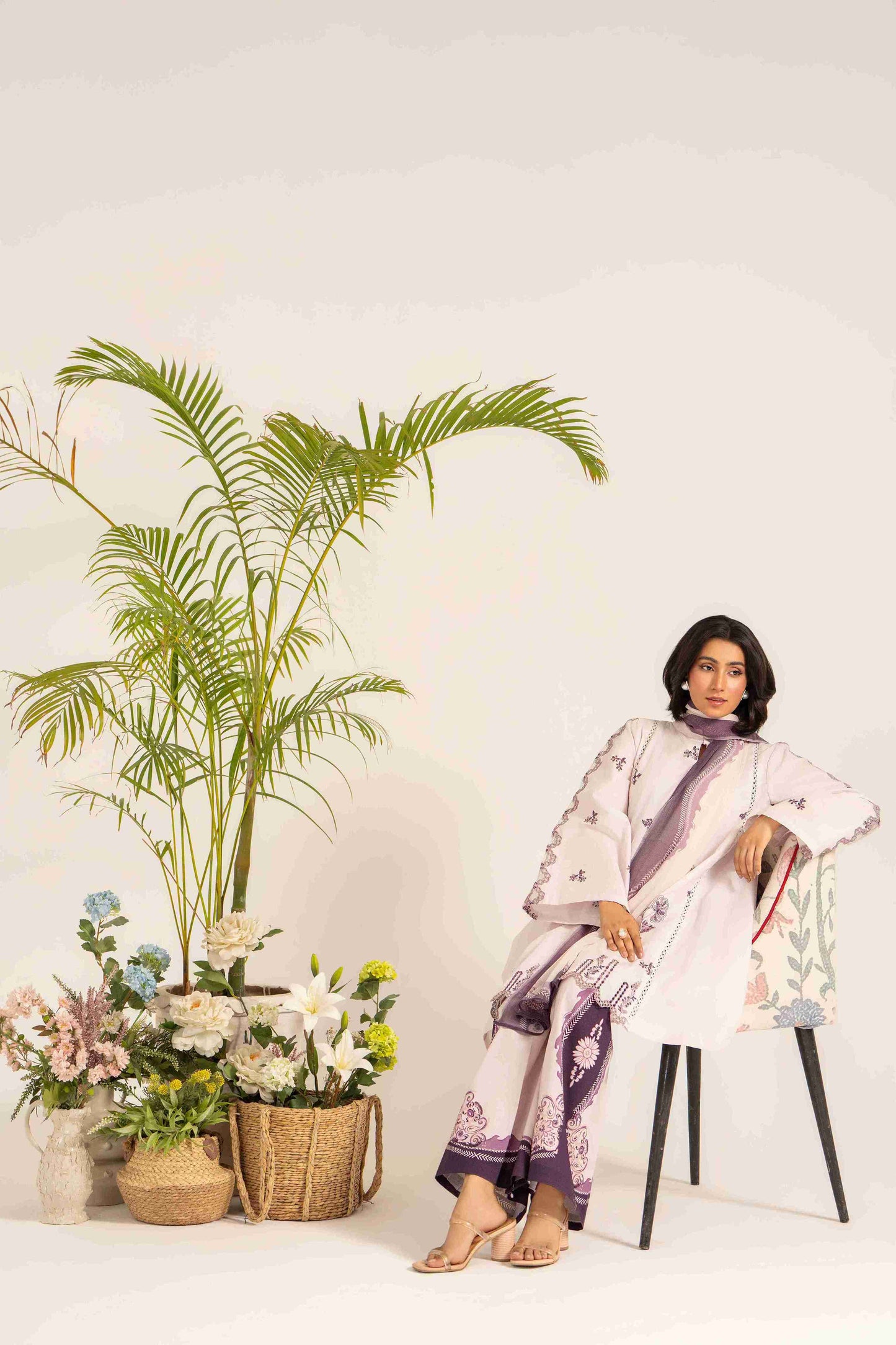  Unstitched embroidered lawn shirt styled with chiffon digital dupatta and cotton trouser