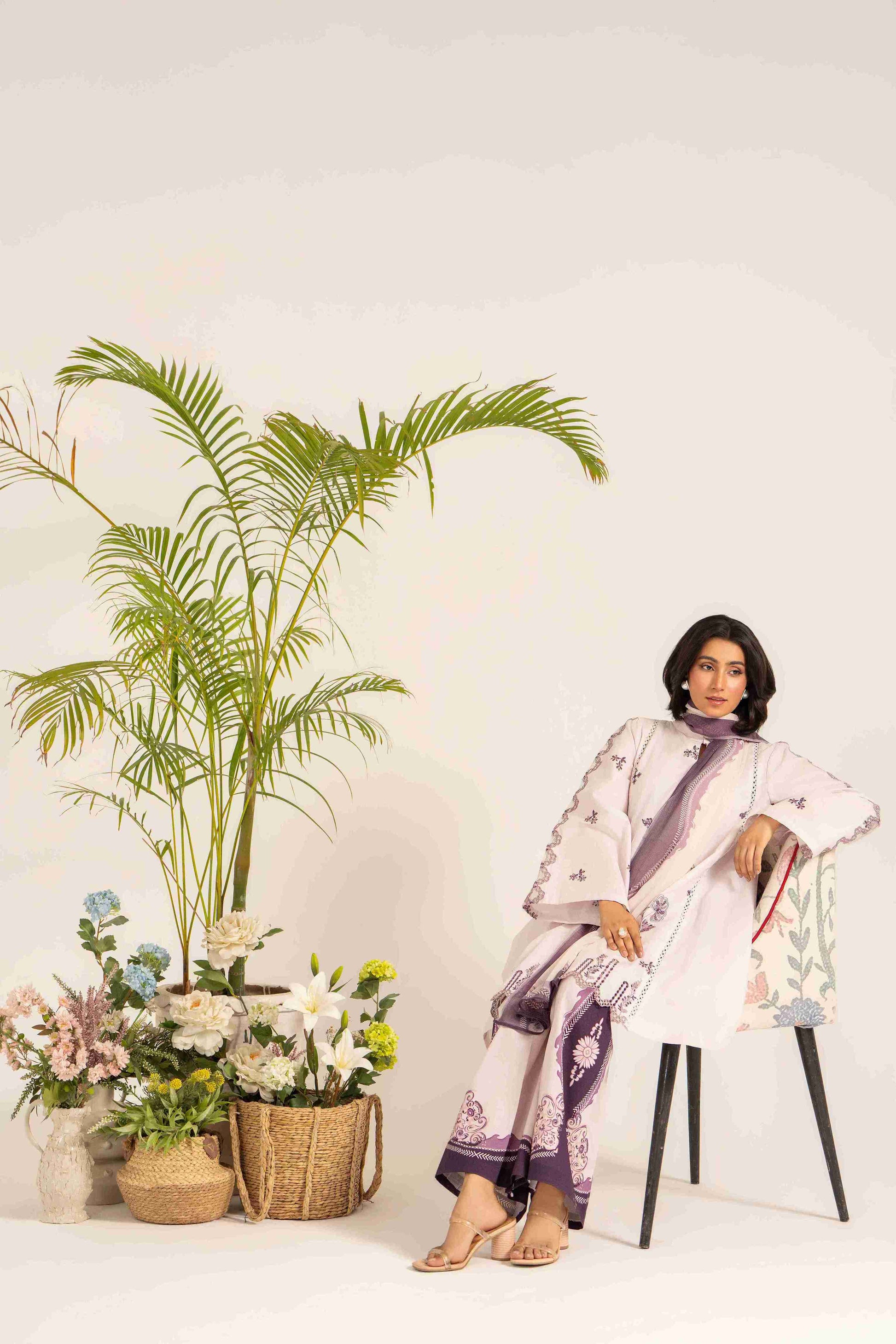  Unstitched embroidered lawn shirt styled with chiffon digital dupatta and cotton trouser