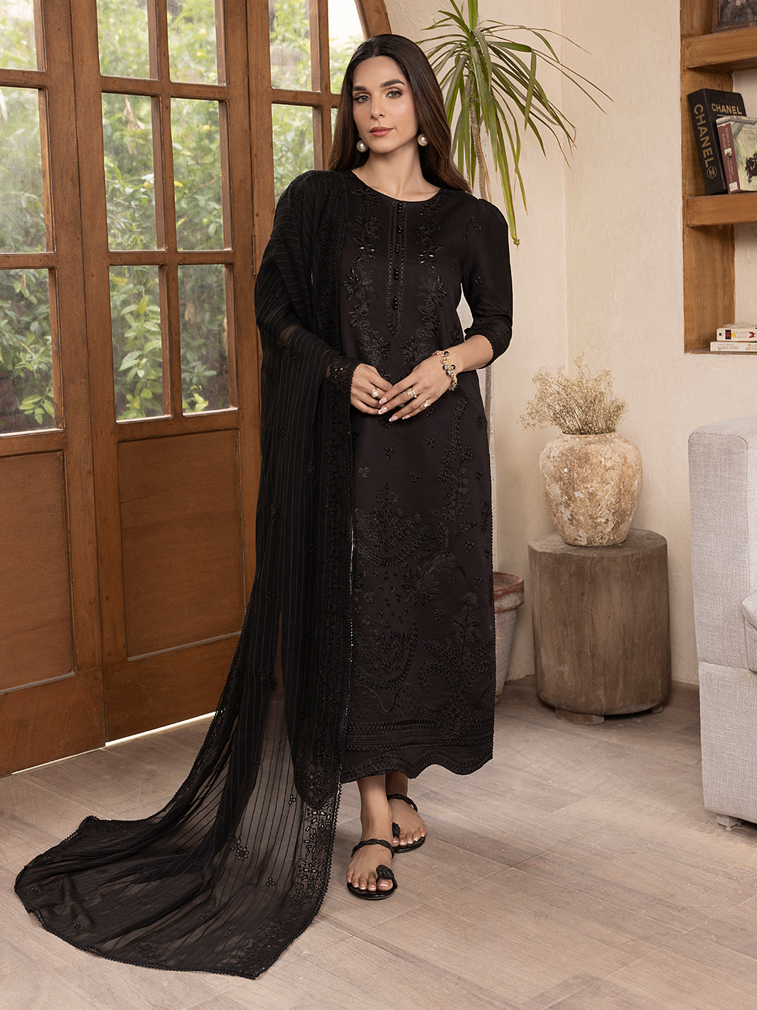 Premium unstitched lawn suit with embroidered patches, designed for elegant summer wear in Pakistan