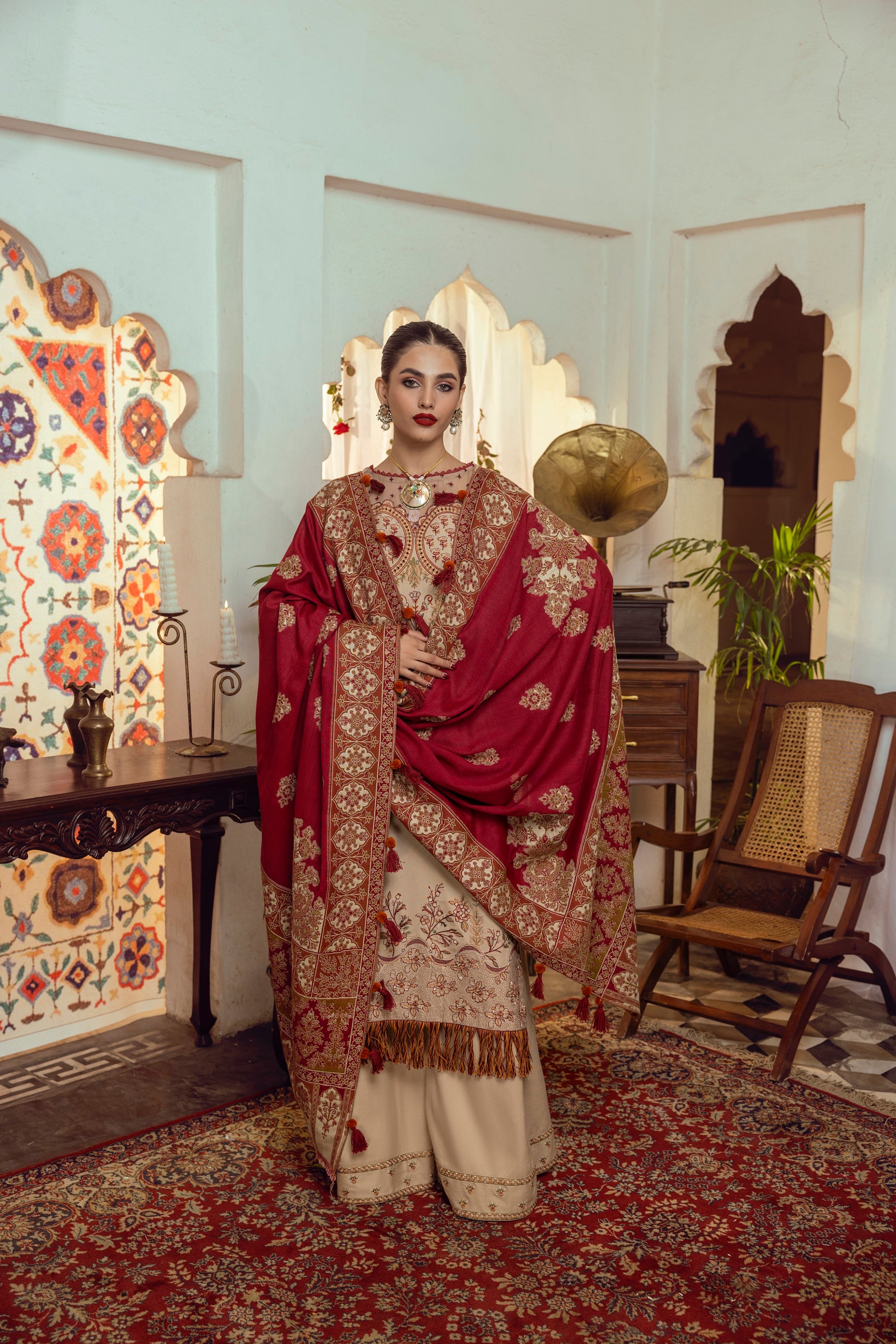 Smooth Marina wool outfit enriched with embroidered frontwork, organza accents, and an artisan-crafted Kashmiri shawl.