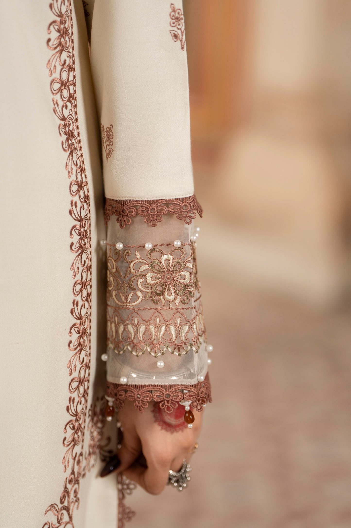 Unstitched winter 3PC featuring intricate Dhanak embroidery and jacquard wool shawl for warmt