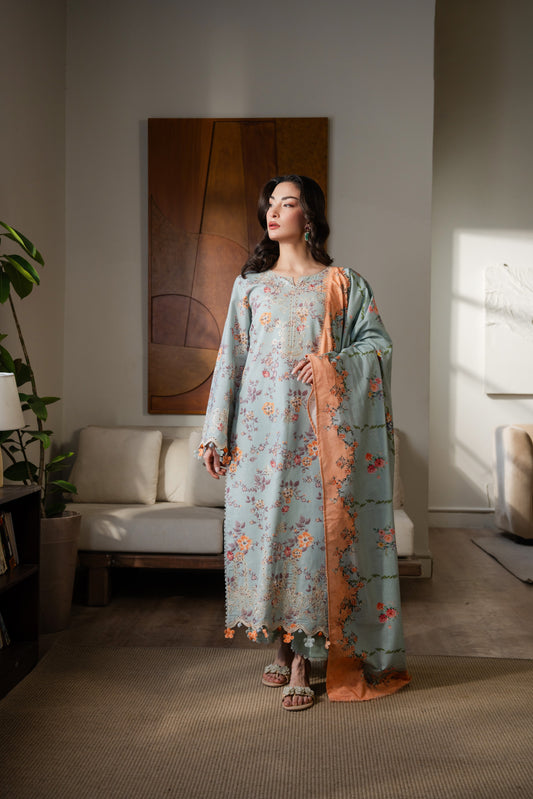 Soft khaddar winter outfit with embroidered organza sleeves and bright printed dupatta.