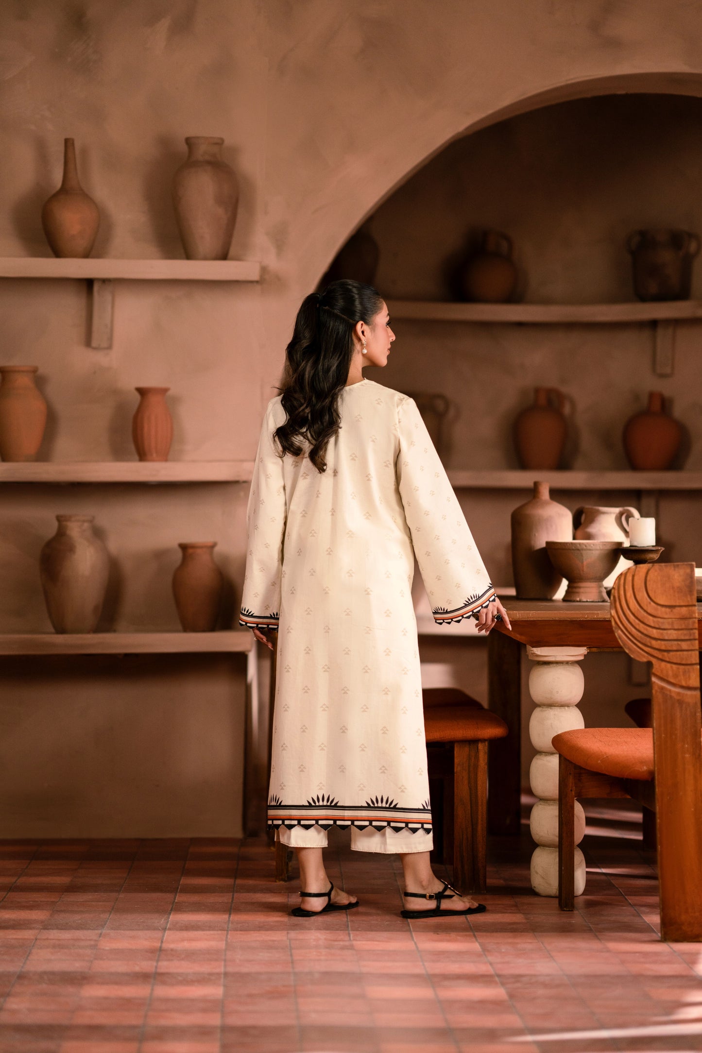 Formal unstitched khaddar winter dress for women with charming printed details