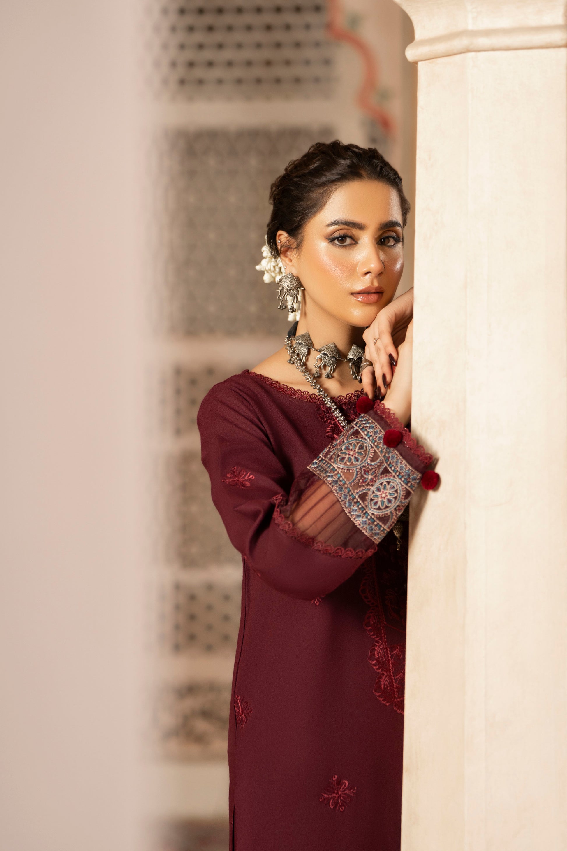 Unstitched embroidered Dhanak winter dress with jacquard woolen shawl for warmth.