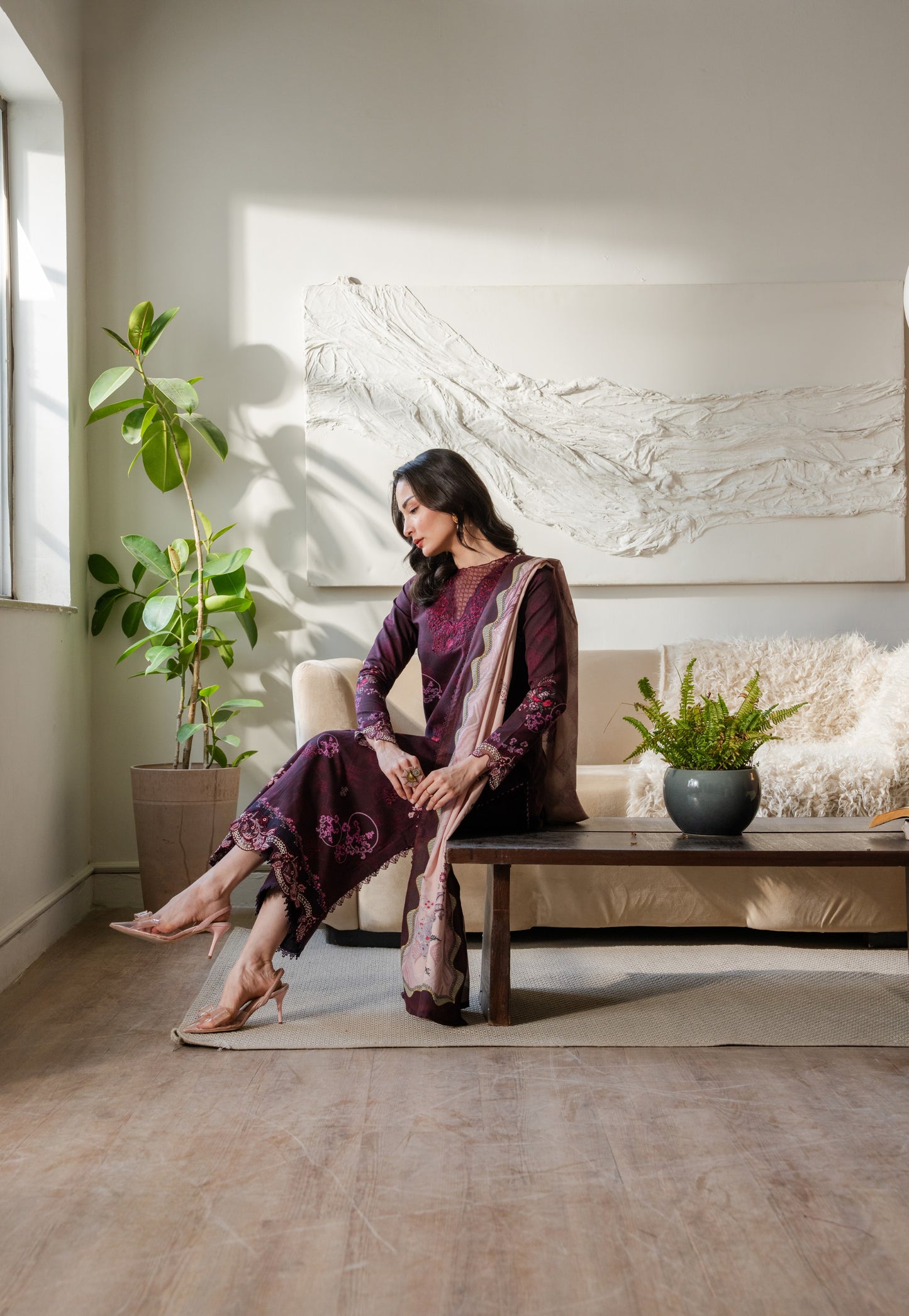 Khaddar winter outfit with printed shirt, embroidered organza borders, and dyed pants.