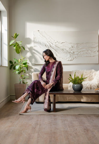 Khaddar winter outfit with printed shirt, embroidered organza borders, and dyed pants.