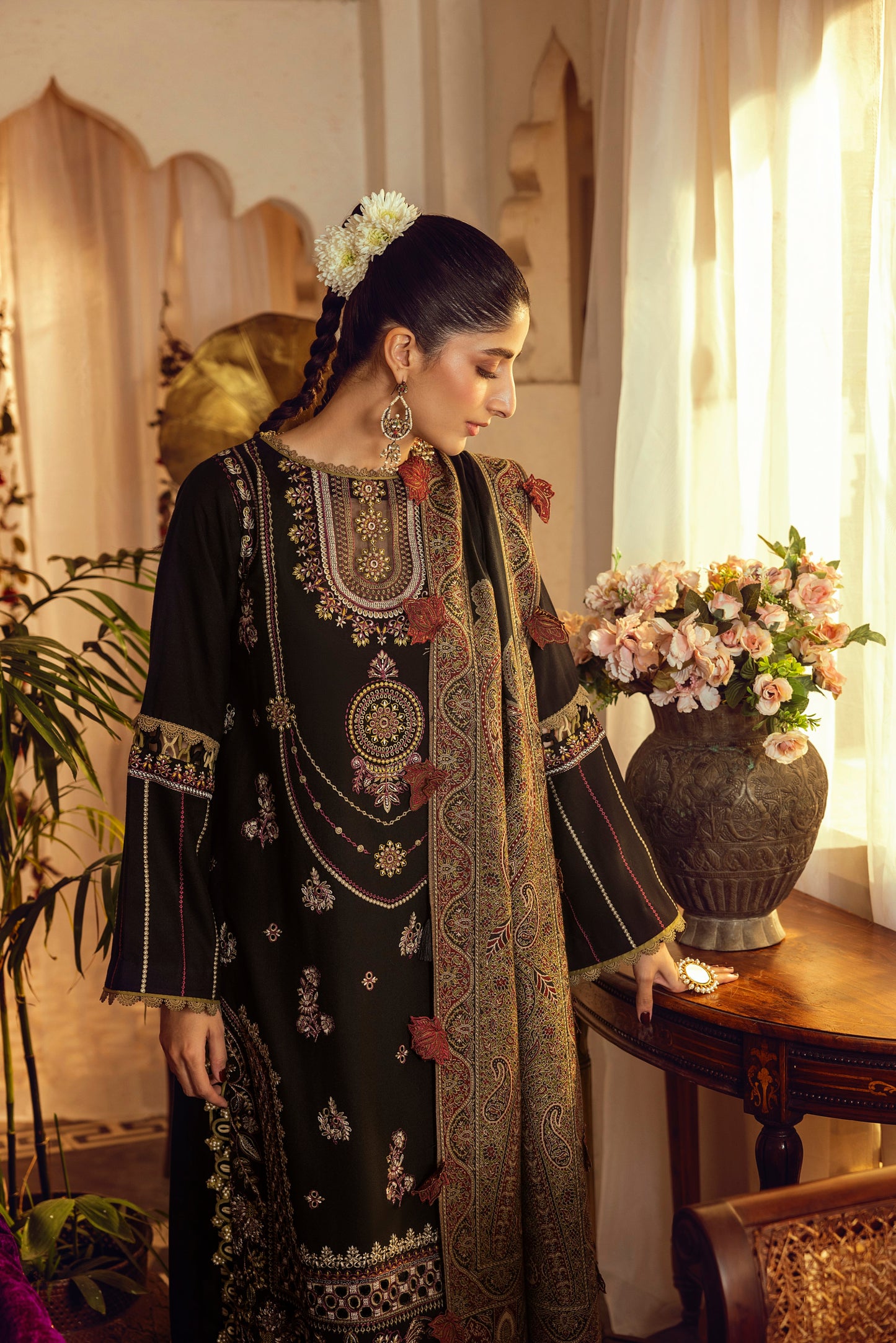 A regal winter suit created with Marina embroidery and a luxury handcrafted Kashmiri wrap.