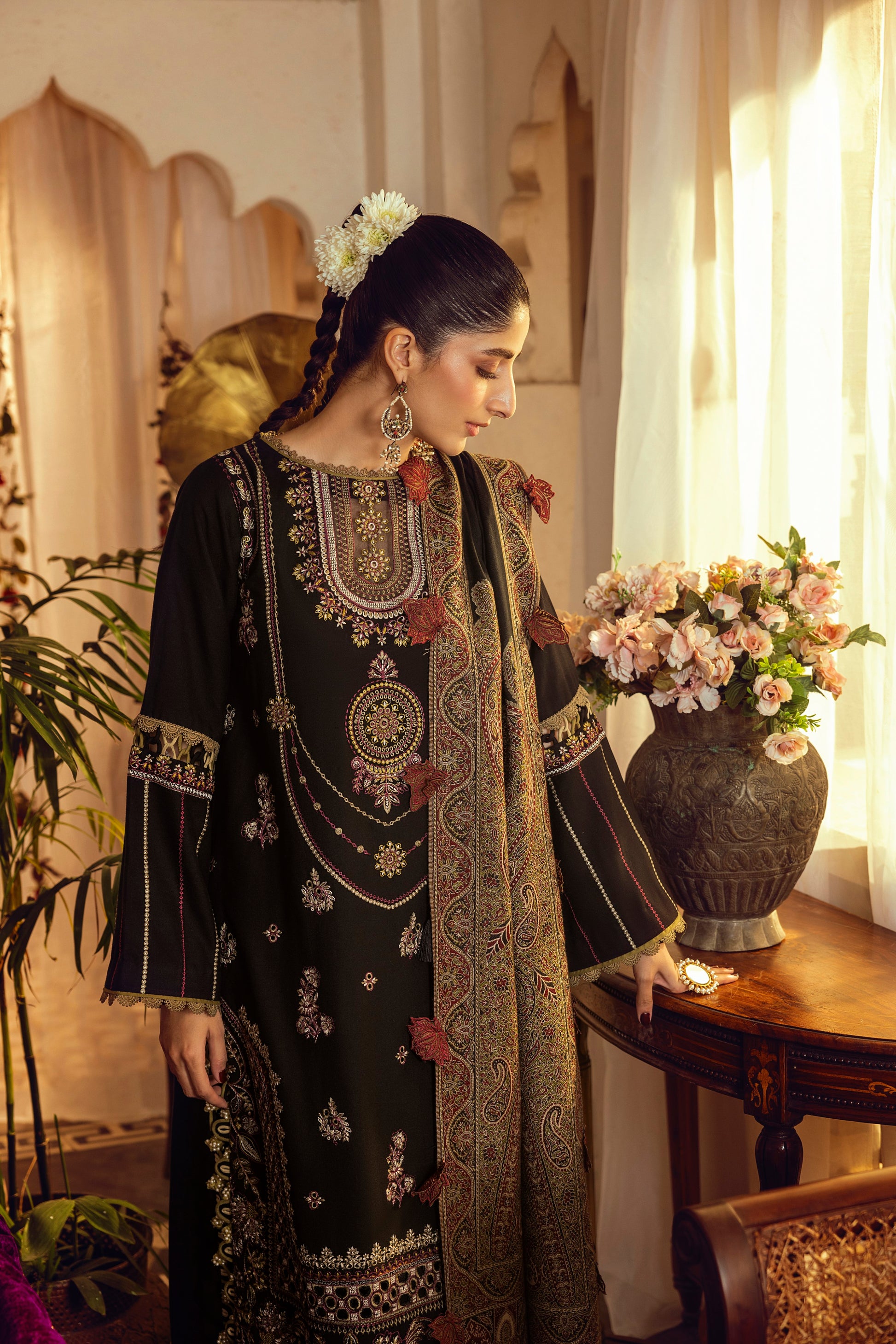 A regal winter suit created with Marina embroidery and a luxury handcrafted Kashmiri wrap.