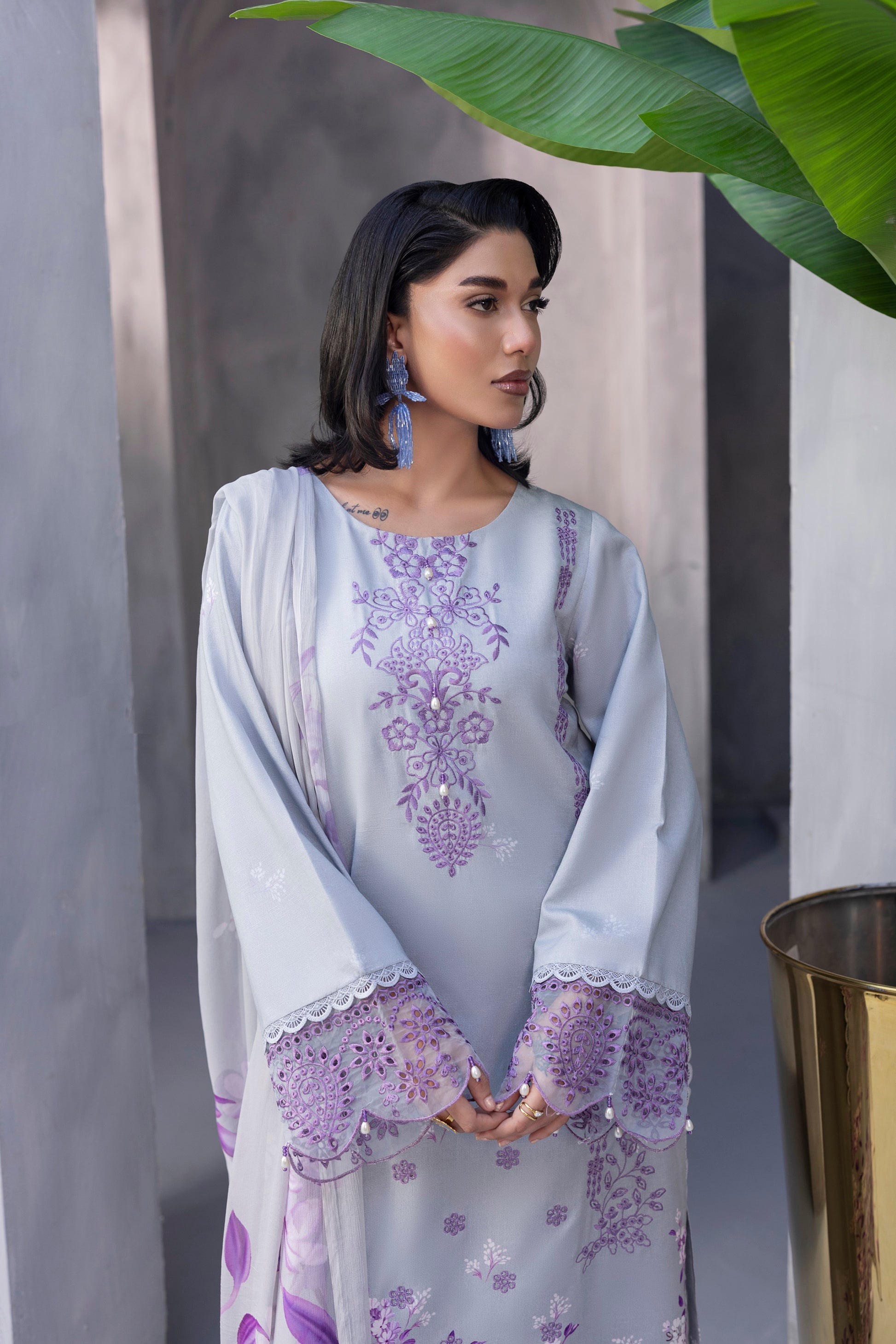 Elegant Karandi winter outfit with detailed embroidery