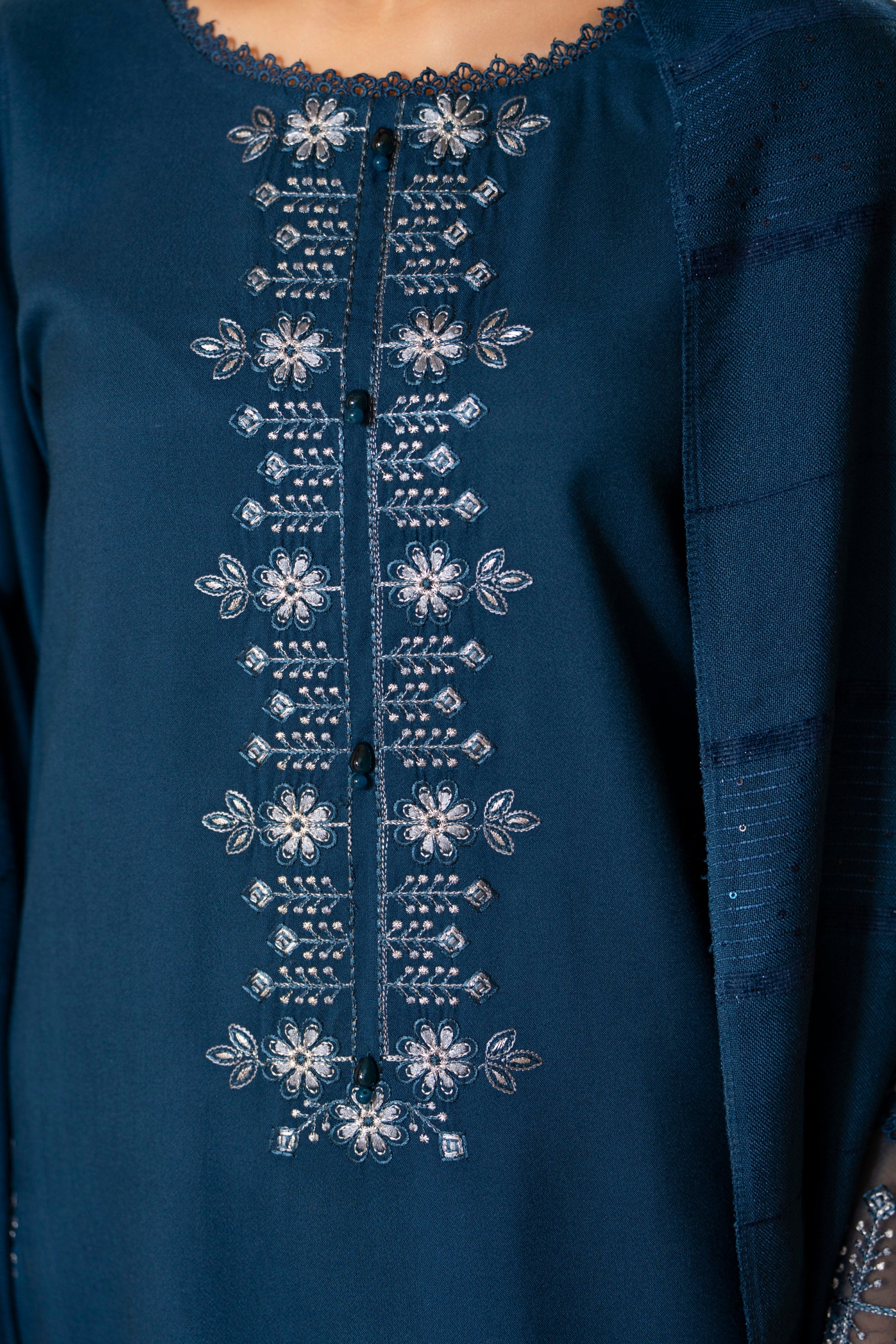 Woolen Dhanak Dress 3-PC; embroidered suit, blending traditional Pakistani style with modern fashion elements for winter